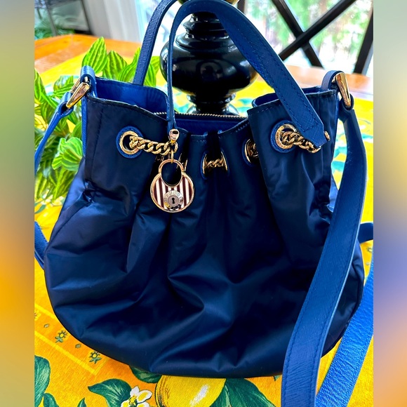 henri bendel Handbags - Henri Bendel Blue Satin Gold Accents Drawstring Crossbody Bag with Charm in VGUC